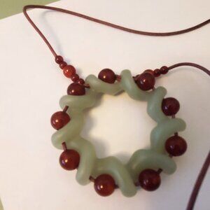 Hand carved solid jade and carnelian necklace